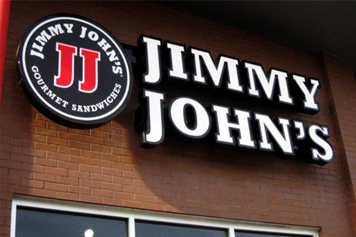 Jimmy John's channel letter signs and graphic against a brick building