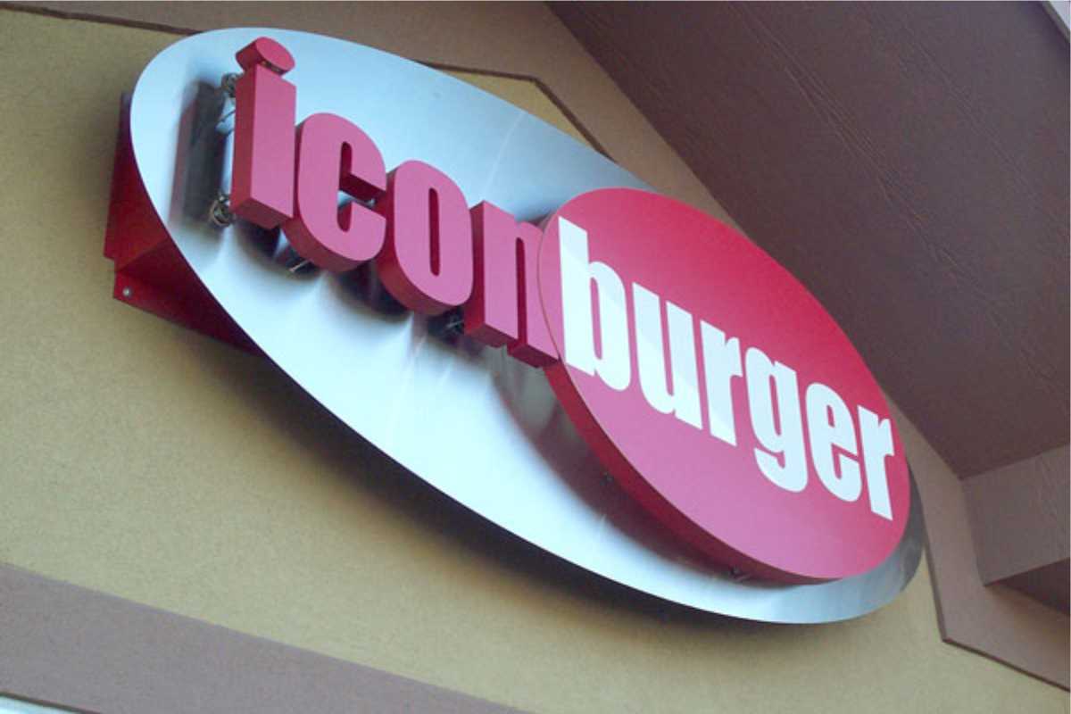 A custom sign depicting the word "ICON" in channel letters and "burger" on an oval background