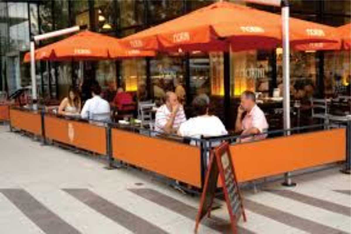 sidewalk barriers outside eating area street cafe