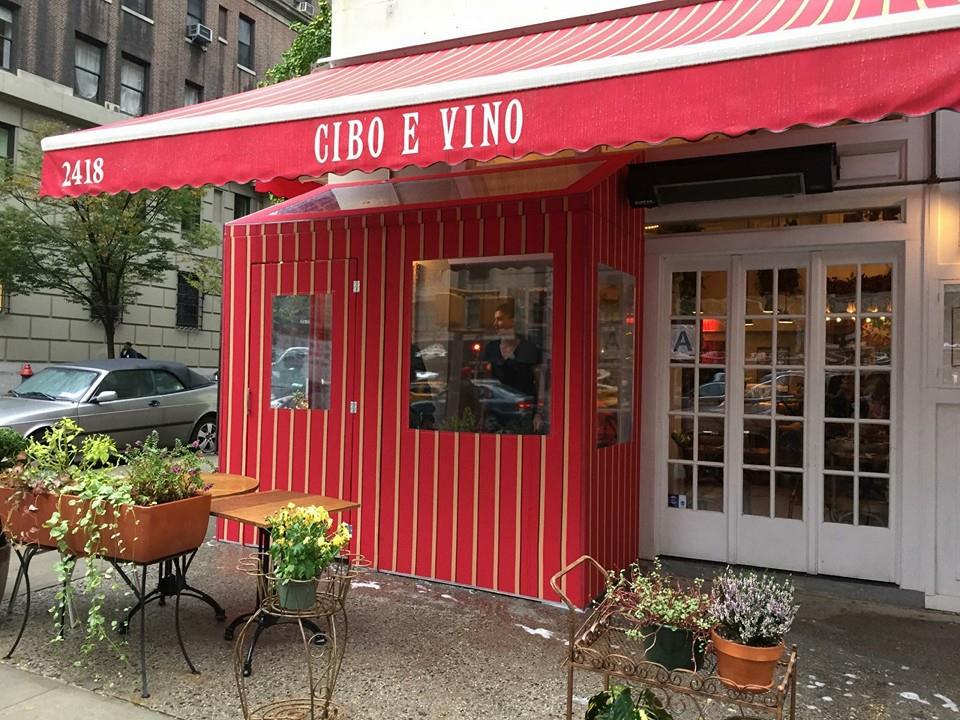 A temporary vestibule and awning outside Cibo E Vino